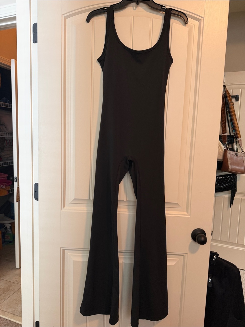 SHEIN Black Sleeveless Scoop-Neck Jumpsuit with Flared Legs